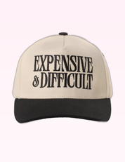 Ninety Nine Boutique super-pale pink accessory product photo: Black Expensive And Difficult Hat (September 30, 2026)