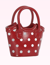 Ninety Nine Boutique super-pale pink accessory product photo: Polka Dot Patent Mini Bucket Tote (September 30, 2026)