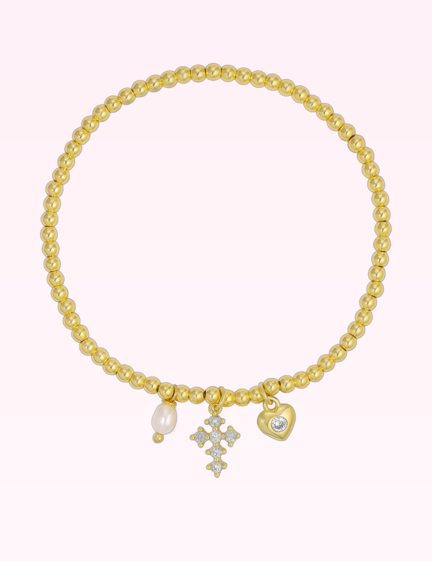 Ninety Nine Boutique super-pale pink accessory product photo: Gold Cross & Heart Charm Beaded Stretch Bracelet (September 30, 2026)