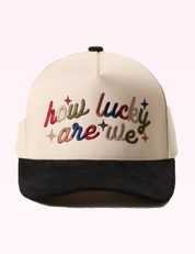 Ninety Nine Boutique super pale pink accessory photo: Black How Lucky Are We Hat (2026-09-29)