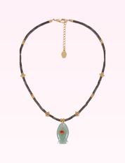 Ninety Nine Boutique super pale pink accessory photo: Green Fish Necklace With Gem (2026-09-29)