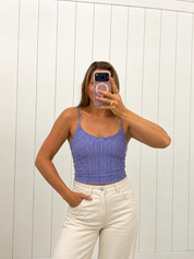 AI-assisted styled photo of Purple Jacquard Pattern Top on boutique owner, soft original-room lighting approved September 21 2026