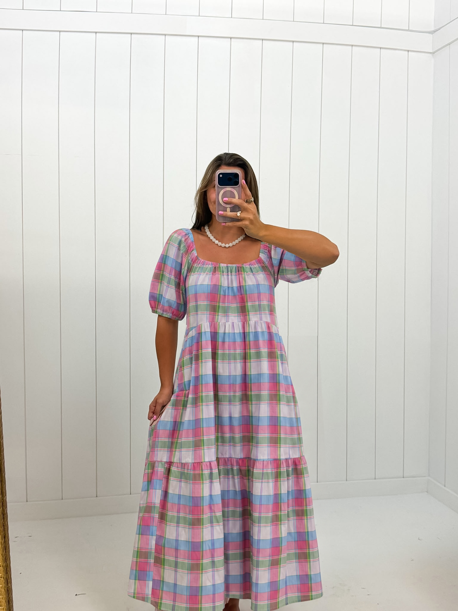 AI-assisted styled photo of Multi Color Plaid Midi Dress on boutique owner, soft original-room lighting approved September 21 2026