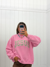 AI-assisted styled photo of Pink Jesus Camo Mockneck on boutique owner, soft original-room lighting approved September 21 2026
