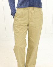 AI-assisted styled photo of Cotton Front Pocket Pants on boutique owner, soft original-room lighting approved September 21 2026