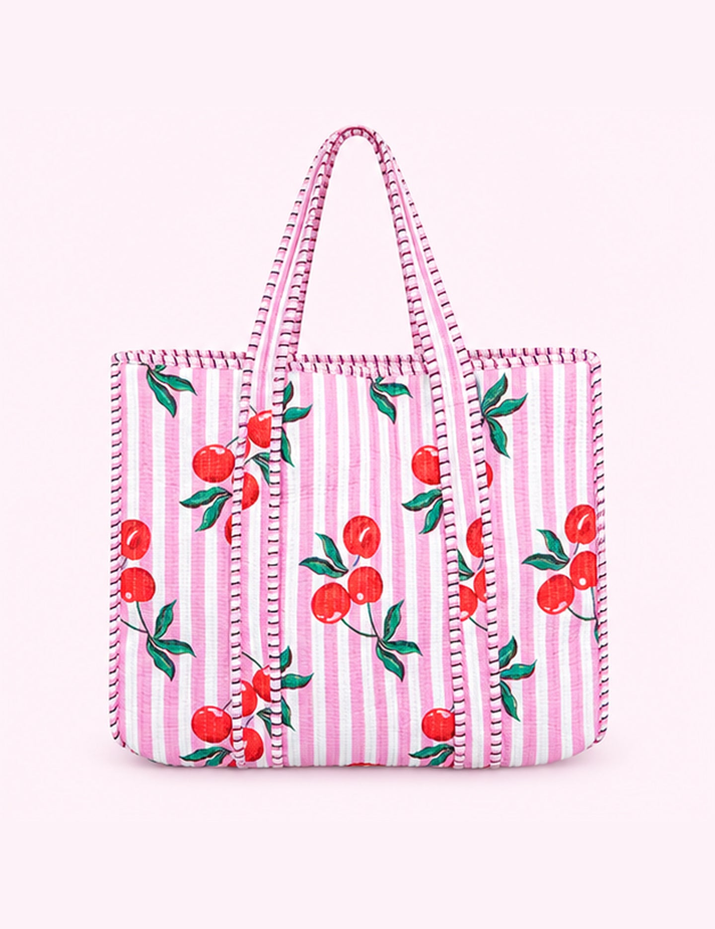 Ninety Nine Boutique super-pale pink accessory product photo: Pink Cherry Reversible Quilted Tote Bag (October 1, 2026)