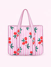 Ninety Nine Boutique super-pale pink accessory product photo: Pink Cherry Reversible Quilted Tote Bag (October 1, 2026)