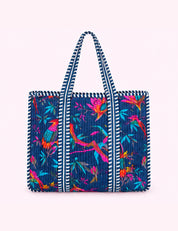 Ninety Nine Boutique super-pale pink accessory product photo: Navy Bird Quilted Tote Bag (October 1, 2026)
