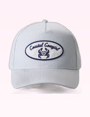 Ninety Nine Boutique super-pale pink accessory product photo: Coastal Cowgirl Crab Patch Seersucker Trucker Hat (October 1, 2026)