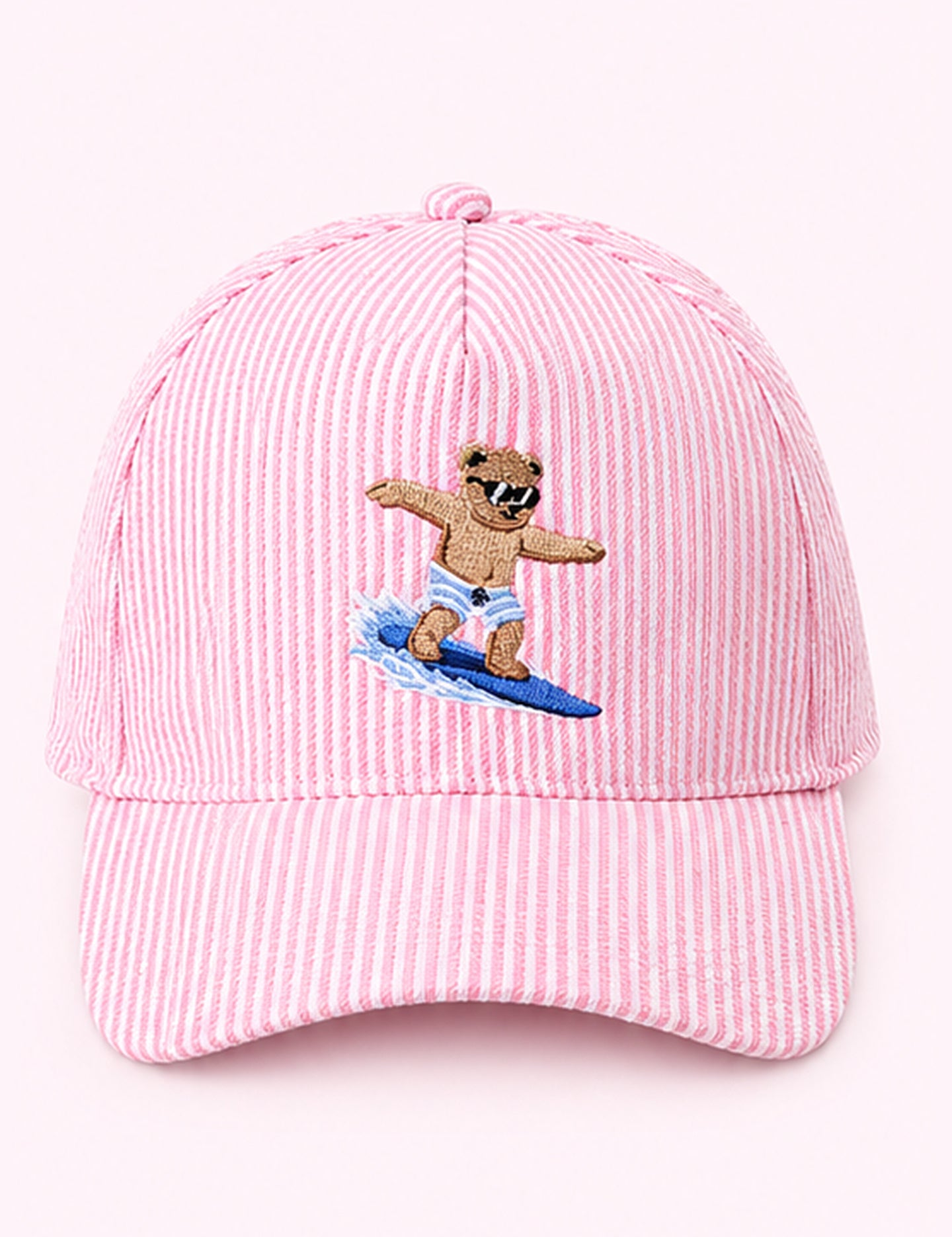 Ninety Nine Boutique super-pale pink accessory product photo: Light Pink Surfing Bear Trucker Hat (October 1, 2026)