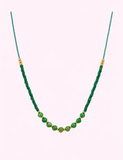 Ninety Nine Boutique super-pale pink accessory product photo: Green Thread Beaded Necklace (October 1, 2026)