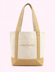 Ninety Nine Boutique super-pale pink accessory product photo: Lazy Sundays Embroidered Tote Bag (October 1, 2026)