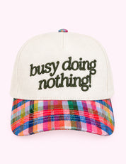 Ninety Nine Boutique super-pale pink accessory product photo: Busy Doing Nothing Trucker Hat (October 1, 2026)