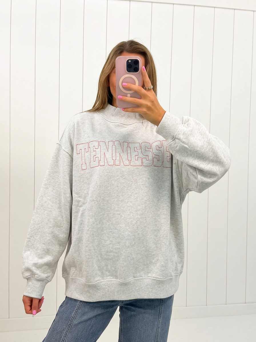 AI-assisted FASHN try-on of Tennessee Outline Mock-Neck, tennessee side; approved September 25, 2026.
