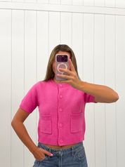 AI-assisted FASHN try-on of Pink Knit Cardigan Top on boutique owner.