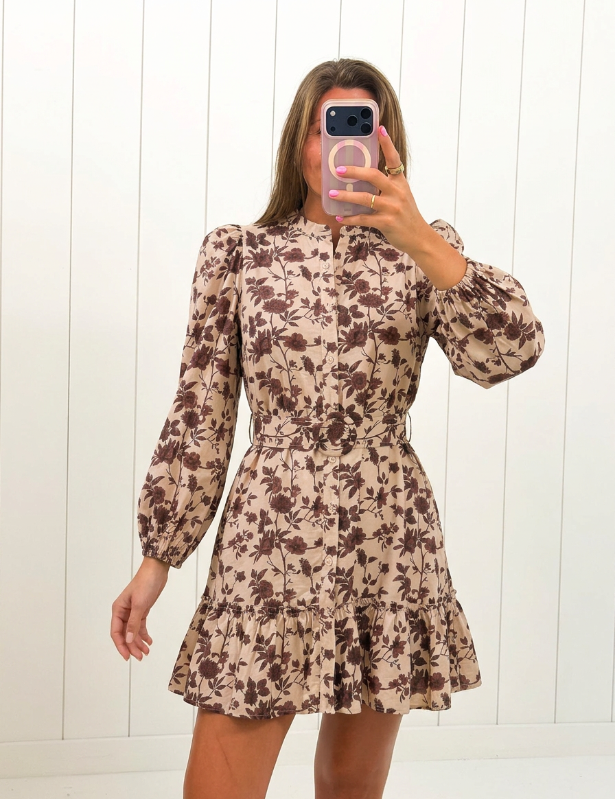 AI-assisted FASHN try-on on boutique owner of Beige Floral Mini Dress; approved September 24, 2026.