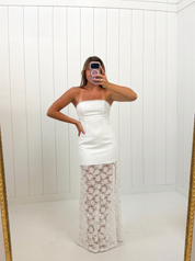 AI-assisted FASHN try-on of White Floral Lace Maxi Dress on boutique owner.