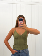 AI-assisted FASHN try-on of Green Jacquard Pattern Top on boutique owner; approved September 24, 2026 redo using IMG_5188.jpeg.