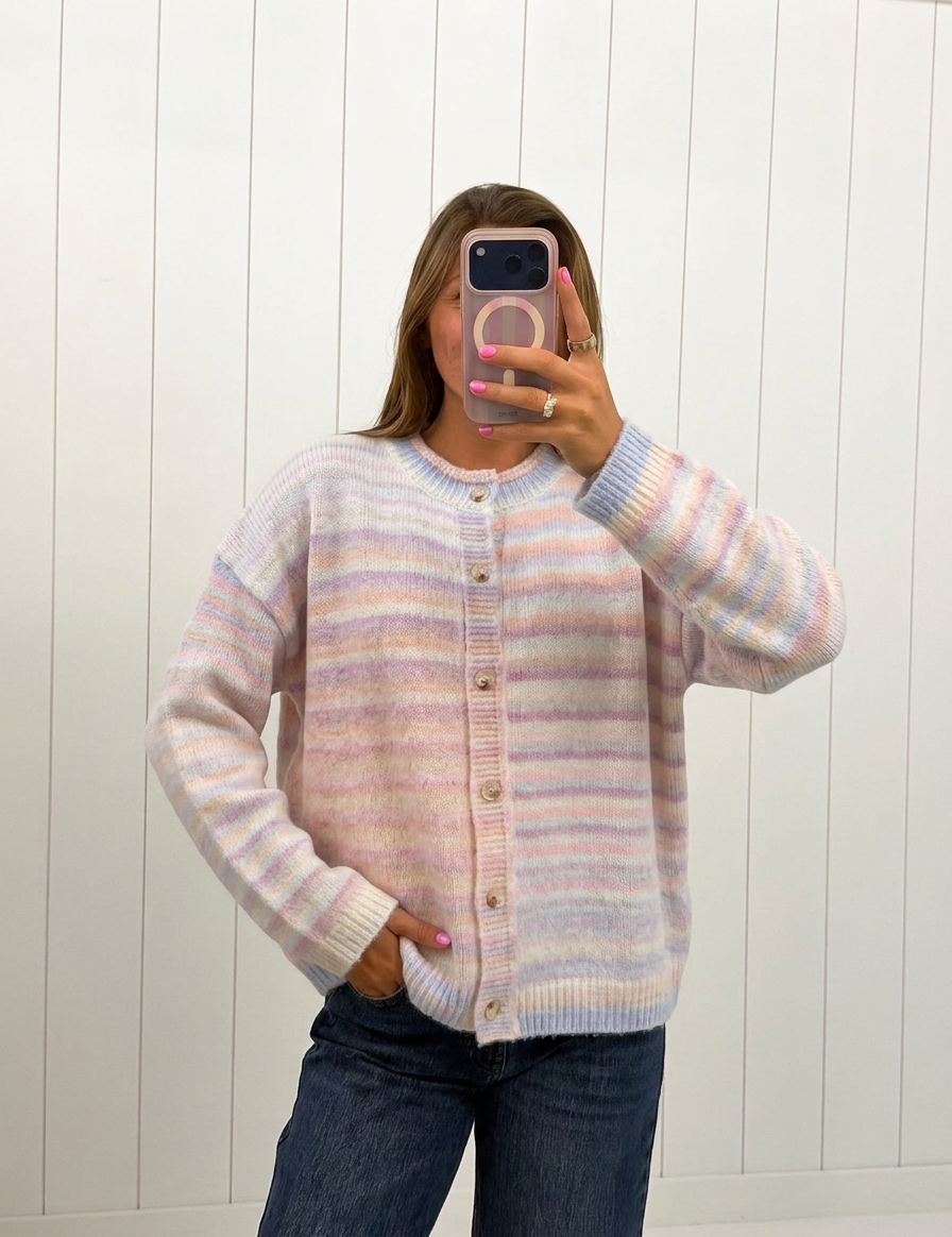 AI-assisted FASHN try-on of Pastel Multi Color Button Up Cardigan on boutique owner.
