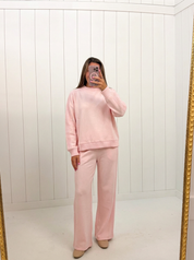 AI-assisted FASHN try-on of Pink Knit Oversized Set on boutique owner; approved September 24, 2026 redo using IMG_5127.jpeg.