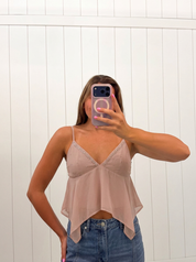 AI-assisted FASHN try-on of Bead Detail V Neck Asymmetrical Hem Babydoll Cami Top on boutique owner.