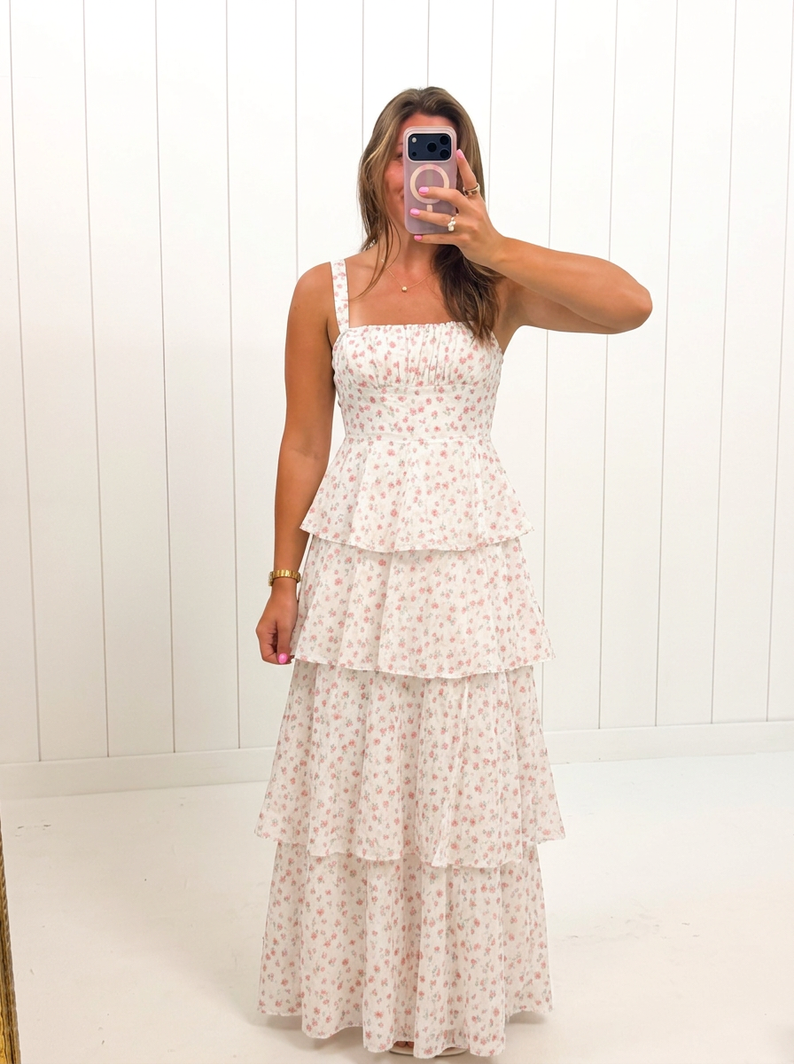 AI-assisted FASHN try-on of White Floral Tiered Maxi Dress on boutique owner.