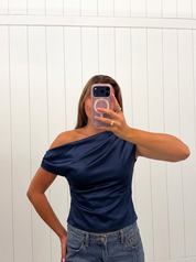 AI-assisted FASHN try-on of Navy Satin Asymmetrical Top on boutique owner; approved September 24, 2026 redo using IMG_5187.jpeg.