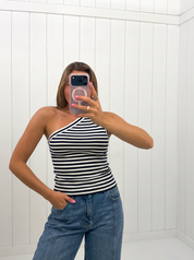 AI-assisted FASHN try-on of Navy One Shoulder Stripe Top on boutique owner.