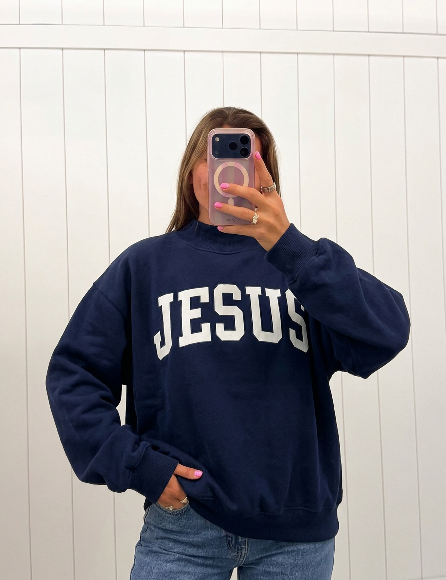 AI-assisted FASHN try-on of Navy Jesus Mockneck, navy side; approved September 25, 2026.