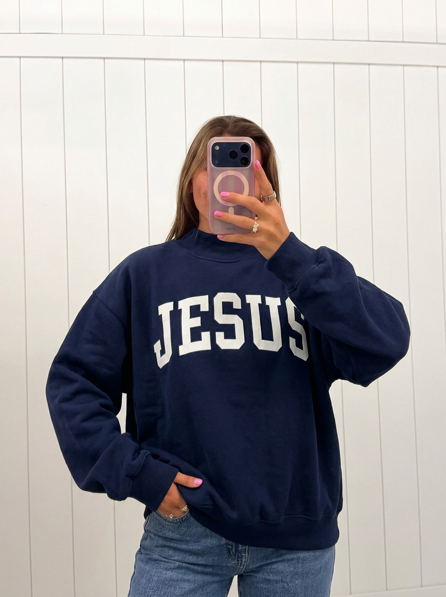 AI-assisted FASHN try-on of Navy Jesus Mockneck, navy side; approved September 25, 2026.