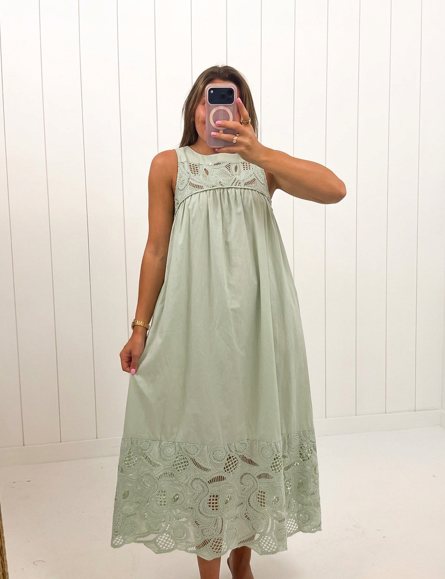 AI-assisted FASHN try-on of Green Boho Lace Maxi Dress on boutique owner.