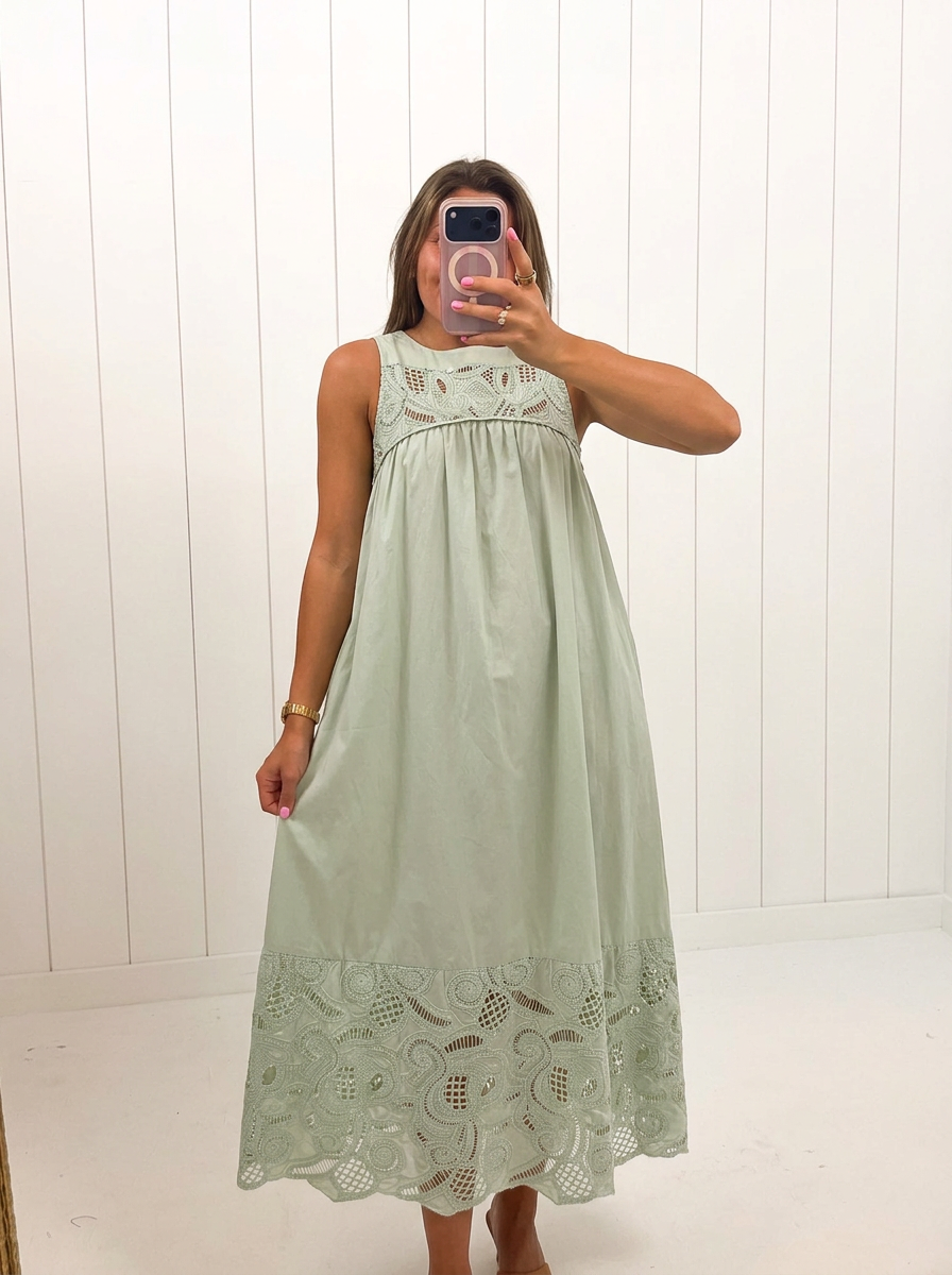 AI-assisted FASHN try-on of Green Boho Lace Maxi Dress on boutique owner.