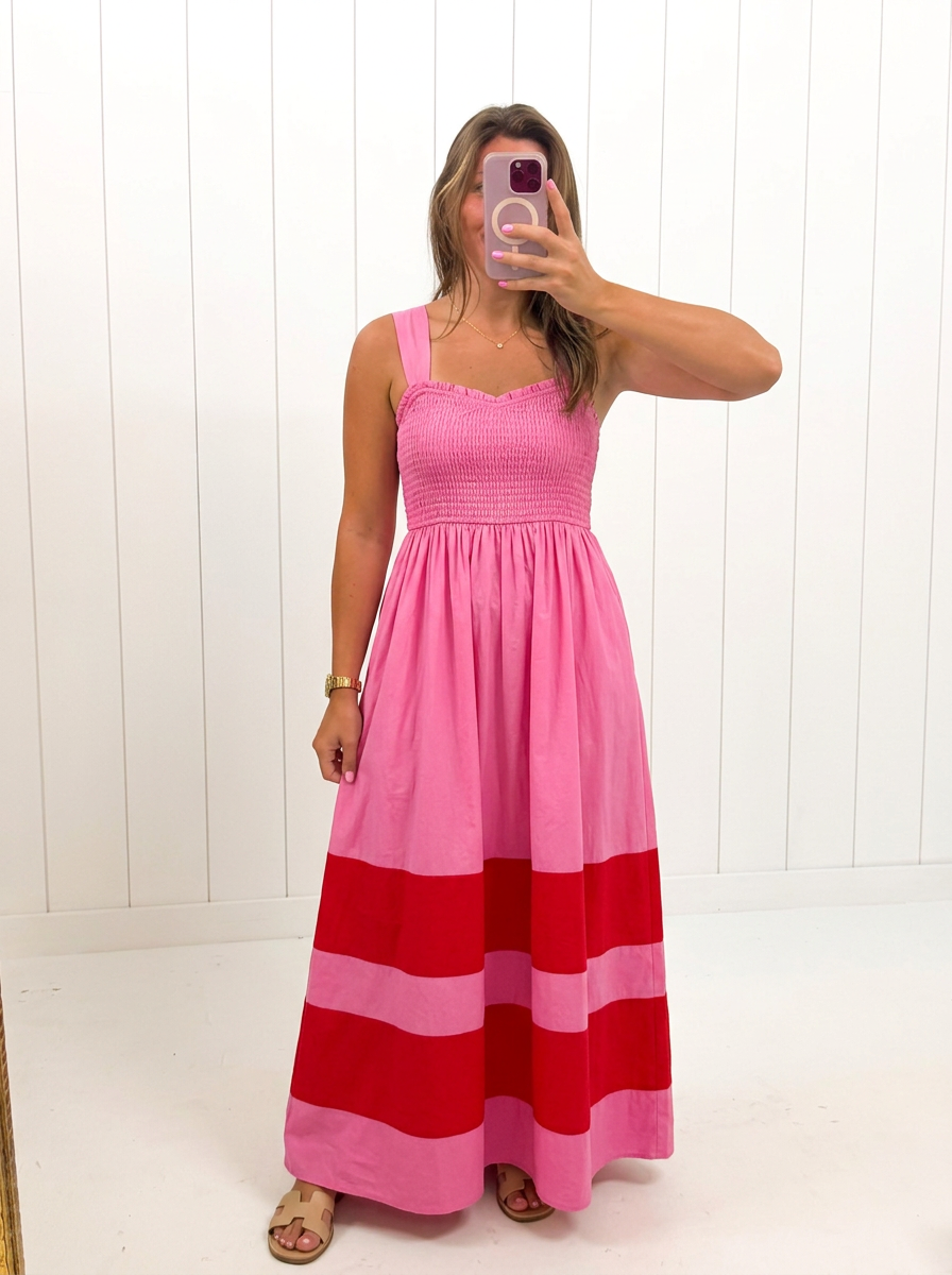 AI-assisted FASHN try-on of Pink Smocked Contrast Maxi Dress on boutique owner.