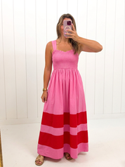 AI-assisted FASHN try-on of Pink Smocked Contrast Maxi Dress on boutique owner.