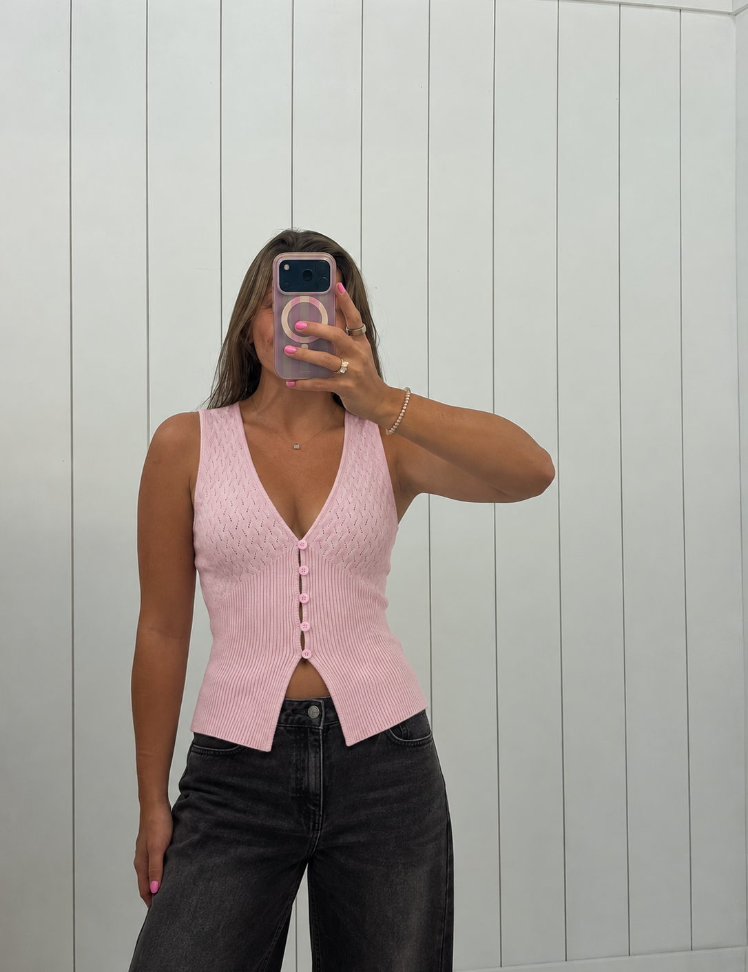 AI-styled preview of Light Pink Pointelle Top with black jeans